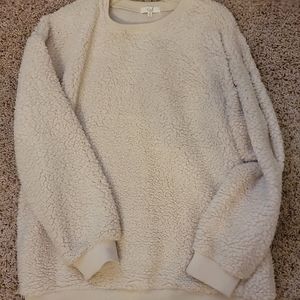 Medium cream colored fleece shirt